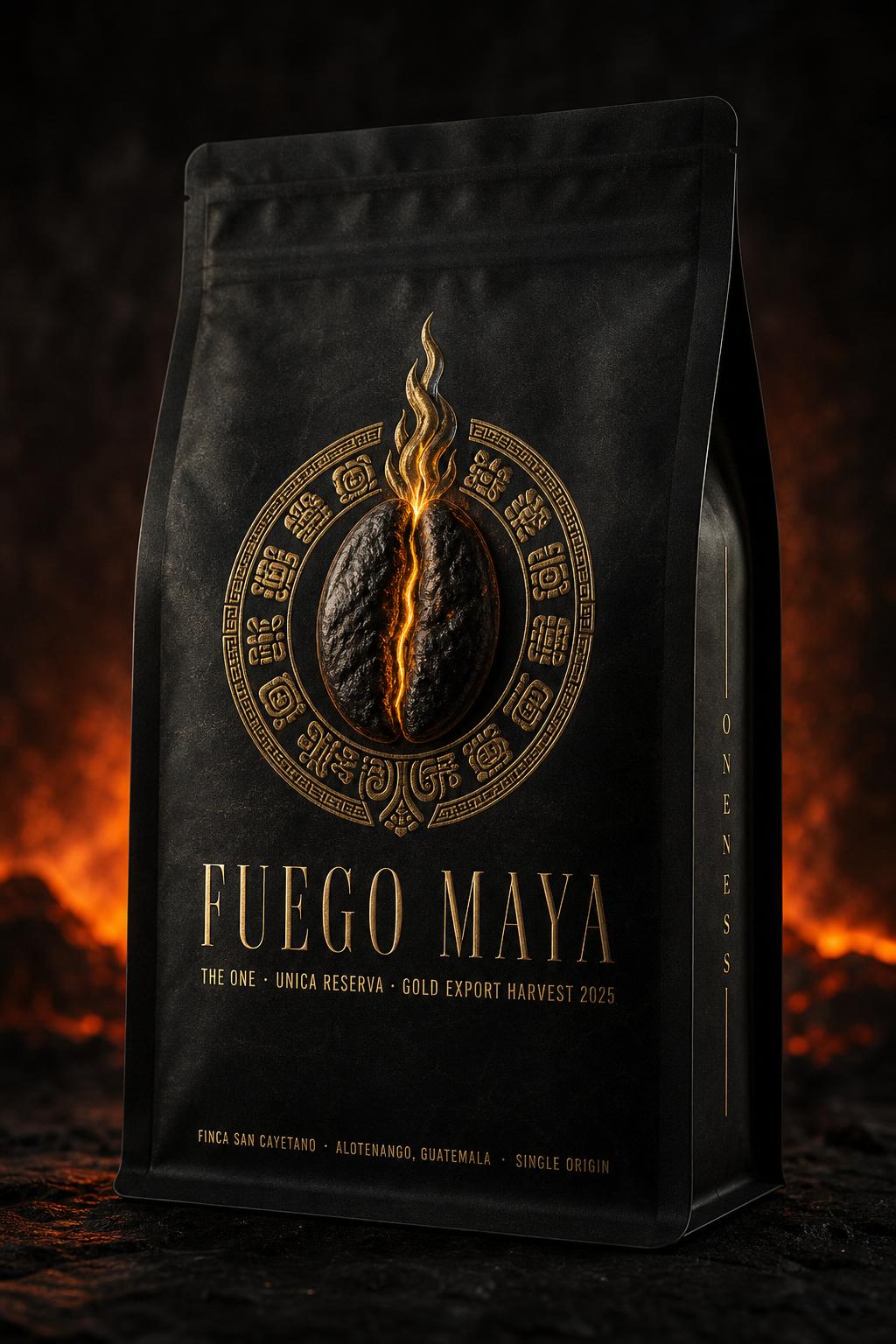 Front of the Fuego Maya coffee bag — matte black pouch with the gold foil obsidian-bean emblem and Mayan glyph ring